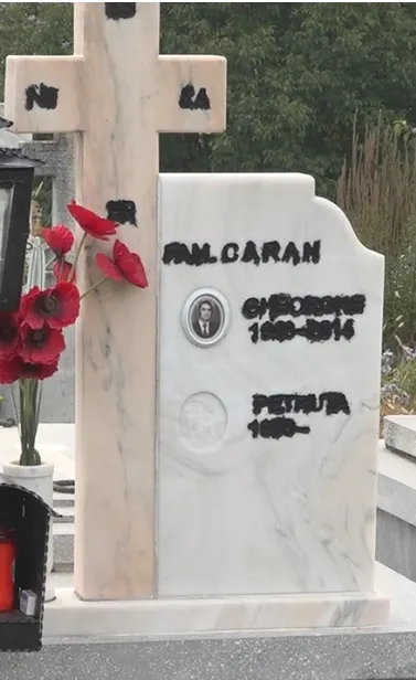 Un mormant a fost profanat,crucea fiind manjita cu vopsea