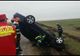 Video-S-a răsturnat cu mașina și a fugit în șosete pe câmp